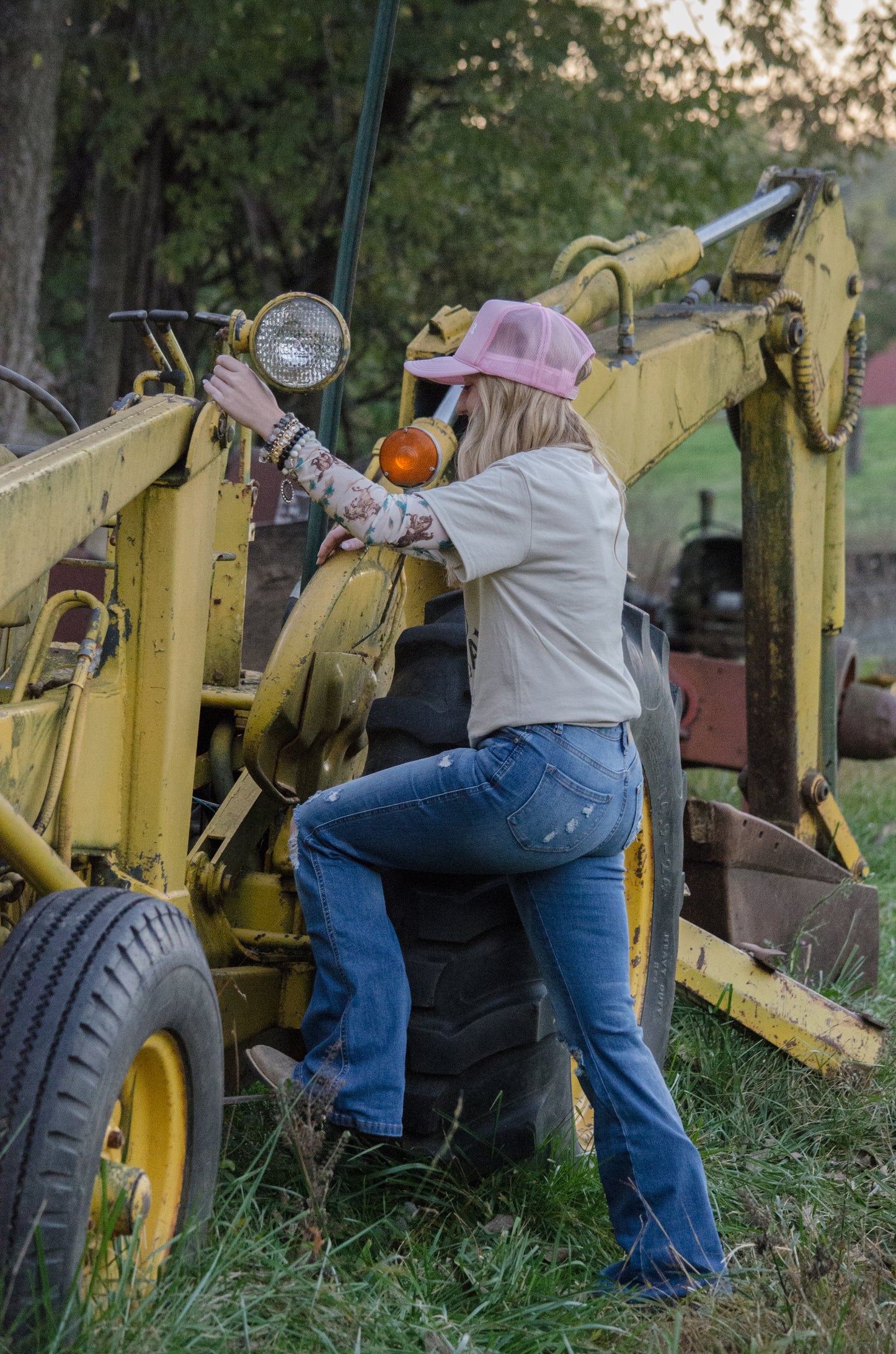 Mid Wash Button Fly Distressed Flare Jeans